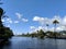 Ala Wai Canal, Canoes, hotels, Condos, Golf Course and Coconut trees at dusk