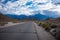 Alabama Hills Recreation Area in Lone Pine California - road through the area with weird rocks and boulders. An approaching storm