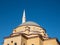 Alanya, Turkey - Jan 4, 2023. Fragment of Fatih Sultan Mehmet Mosque building in the rays of the morning sun