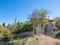 Alanya, Turkey - Nov 3, 2022. An old stone house situated on a hillside in Alanya fortress, ensconced within a garden and a lush