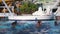 Alanya, Turkey - October 18, 2016: Animator in pool does water aerobics