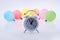 Alarm clock and colorful small Balloons