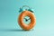 Alarm clock made of donut. Breakfast time, creative minimal concept. Fast food, sweets, sugar, diet, mealtime, break at work.