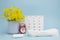 Alarm clock, menstrual pads, tampons and menstrual cup for blood period. Menstruation period pain protection. Feminine hygiene