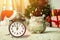 Alarm clock with santa hat, christmas symbol