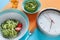 Alarm clock, Spiral Fresh Cucumber Spaghetti with pesto - Vegetarian, Diet Food, Vegetable Salad,  Intermittent fasting concept,
