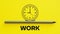 Alarm clock and text WORK on bright yellow background. Business, career, waste of time, procrastination concept