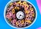 Alarm clock on top of multicolored breakfast cereals