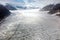 Alaska aerial landscape of mountaintops and wide glacial valleys and ice flows