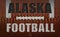 Alaska Football Text on a Flattened Football