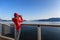 Alaska Glacier Bay cruise ship passenger looking at Alaskan mountains on Vacation adventure