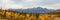 Alaska mountains landscape nature background in autumn fall season. Snow peaks panorama