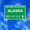 ALASKA road sign against clear blue sky