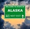 ALASKA road sign against clear blue sky