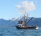 Alaskan fishing boat heading out to sea