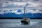 alaskan fishing boat returning to port, with fresh catch