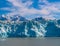 Alaskan Glacier in Blue Waters with Mountains