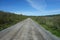 An alaskan road with a runway