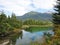 Alaskian Mountain in background of lake on the edge of a temperate rainforest