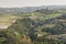 Alba church and Piemonte vineyards and hills in spring, Italy