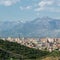 Albanian city Shkoder cityscape with mountain background