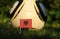 Albanian flag on wooden stick. Red square with state symbol in the middle. Albania football team. World Championship 2022. Euro