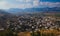 Albanian landscape, distant view on the mountains and valley with small town.