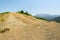 Albanian nature landscape. Sandy hills with rainwater sign on the soil