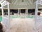 ALBANY, NASSAU. BAHAMAS - JULY 21, 2018. White bench, gazebo in a pool in the garden of a luxury resort