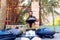 Alberobello, Italy - March 9, 2019: Busker with dreadlocks playing a Hang, percussion musical instrument Handpan, and selling his