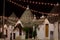 Alberobello trullo at night decorated with hundreds of little li