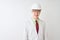 Albino scientist man wearing glasses and helmet standing over isolated white background with a happy and cool smile on face