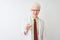 Albino scientist man wearing glasses holding glass of water over isolated white background with a happy face standing and smiling
