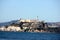 Alcatraz Island in San Francisco Bay with boats, ships in background, California, USA