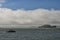 Alcatraz view on cloudy sky