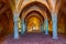 ALCOBACA, PORTUGAL, MAY 28, 2019: View of an arcade inside of the Alcobaca monastery in Portugal