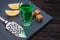 Alcohol Absinthe drink with a sugar cubes, spoon and lemon slice