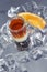 Alcohol Cocktail on ice cube background
