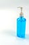 Alcohol gel bottles for hand washing. Disinfecting alcohol. Handwashing alcohol has a clear blue color on a white background