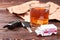 Alcohol, keys, ambulance, wooden background.