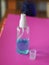 Alcoholic 70 percent in clear Plastic bottle Spray, Hand Sanitizer on pink background washing clean dirty to prevent germs protect