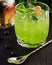 Alcoholic cocktail basil smash with green basil