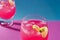 Alcoholic cocktail. Cool pink alcoholic drink on colored background. Generative AI.