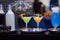 Alcoholic drinks. Barman made stylish modern neon smoky cocktails