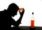 Alcoholic drunk man with whiskey glass in alcohol addiction silhouette