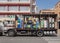 an alcoholic and non-alcoholic beverage delivery truck, parked on the street