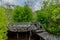 Alcove and bridge made of wooden planks at the mangrove tropical nature park at Landhoo island at Noonu atoll