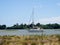 ALDEBURGH, SUFFOLK/UK - JULY 31 : Yacht Cruising down the River