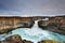 Aldeyjarfoss is an amazing waterfall in northern Iceland. Icelandic natural landscape at sunrise.