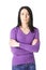 Alert woman in purple sweater with arms folded